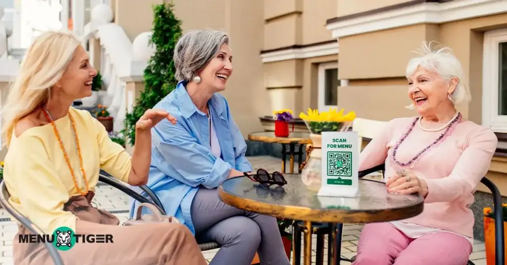 Elderly people gathered around a table